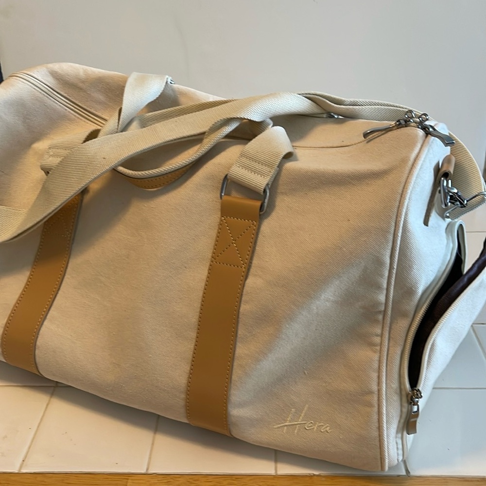Hera Cream Colored Canvas Dufflel Overnighter Bag.  New without tags.